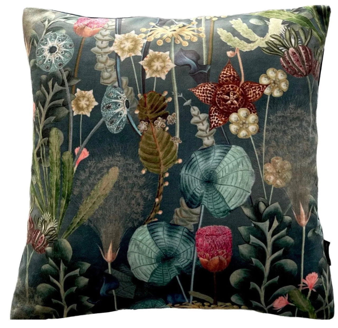 Decorative pillow with floral pattern on a dark background