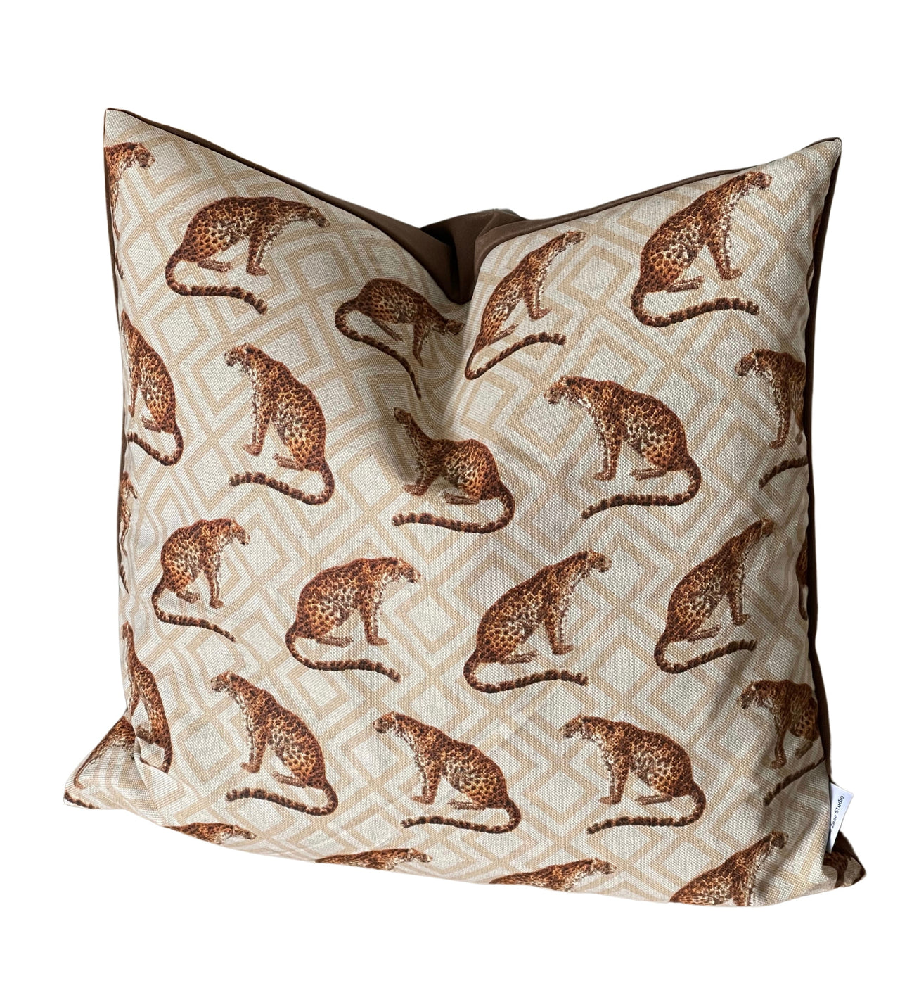 Safari-style pillow with illustrated cheetahs