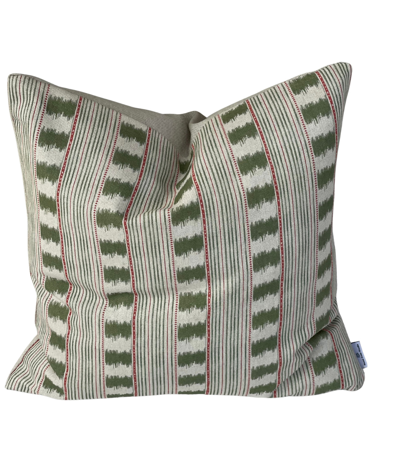 Sage green Stitch Stripe cushion cover on natural linen-look fabric with subtle red detailing.