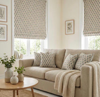 Thumbnail for Sage and rust botanical cushion covers styled on a neutral sofa with matching Roman blinds