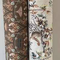 Thumbnail for Side-by-side comparison of dark brown and beige versions of Savannah fabric with jungle animal scenes — suitable for custom blinds and bold upholstery projects.