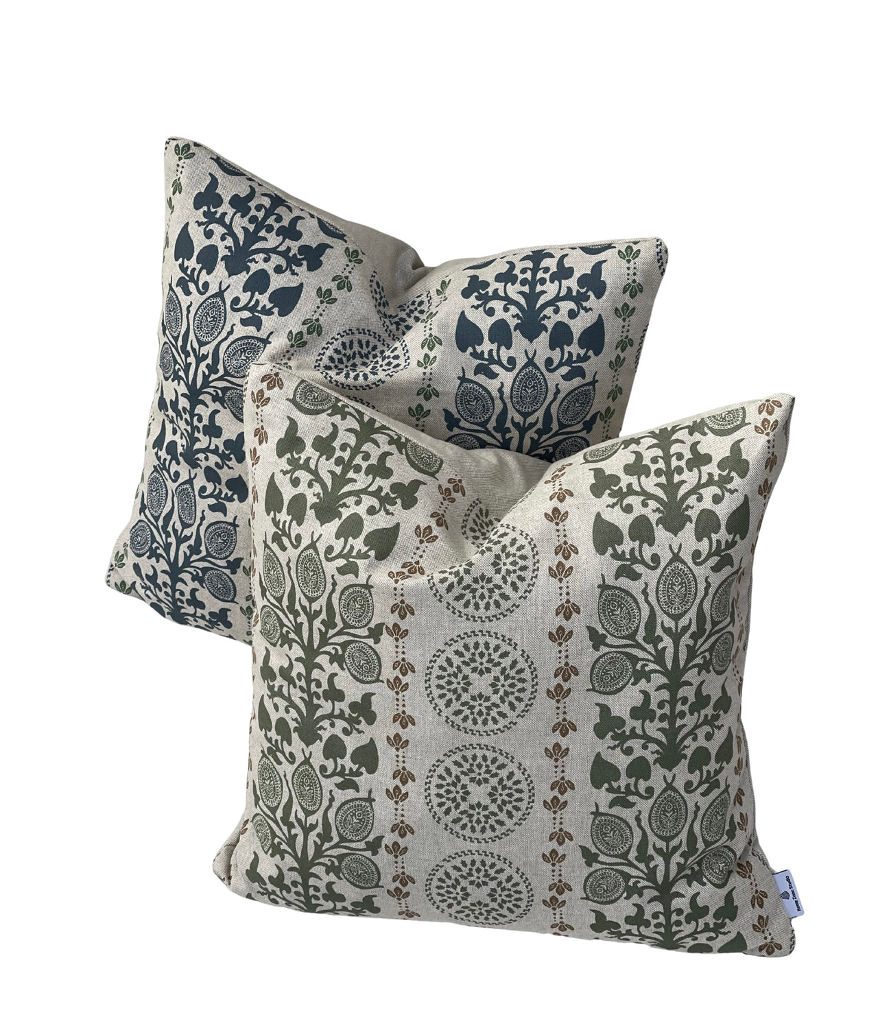 Scandinavian style cushion cover with blue botanical motifs and natural linen-look texture.