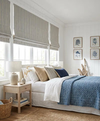 Thumbnail for Seabreeze blue and beige striped Roman blinds in a bright coastal-style bedroom
