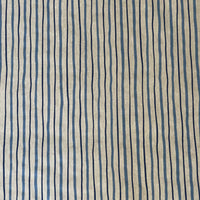 Thumbnail for Irregular navy and blue vertical stripe pattern on a natural beige background