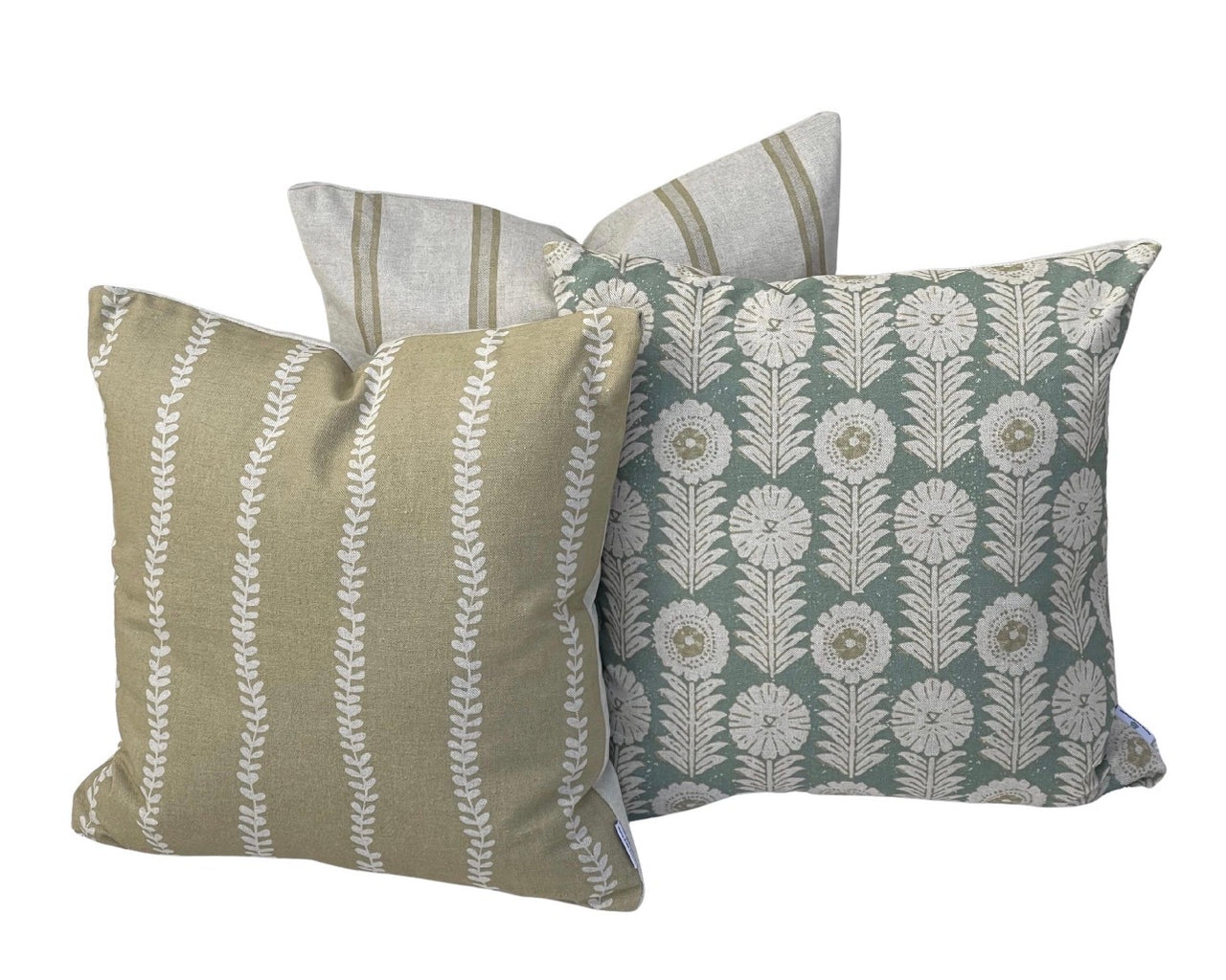 Soft gold botanical stripe cushion styled with Jacobean floral and neutral ticking stripe cushion covers
