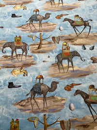 Thumbnail for Surrealist blue cotton fabric arranged in soft folds, displaying its animal print and decorative pattern for home furnishing projects.