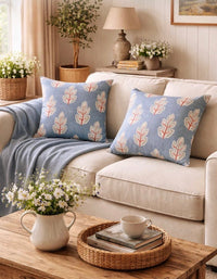 Thumbnail for Teal botanical cushion cover styled on a sofa