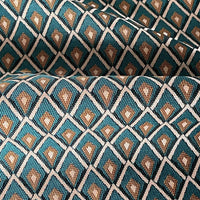 Thumbnail for Folded teal and gold lattice fabric highlighting soft drape and structure