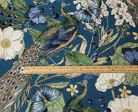 Thumbnail for Decorative fabric with peacocks, butterflies, and flowers on a blue background, measured with a ruler.