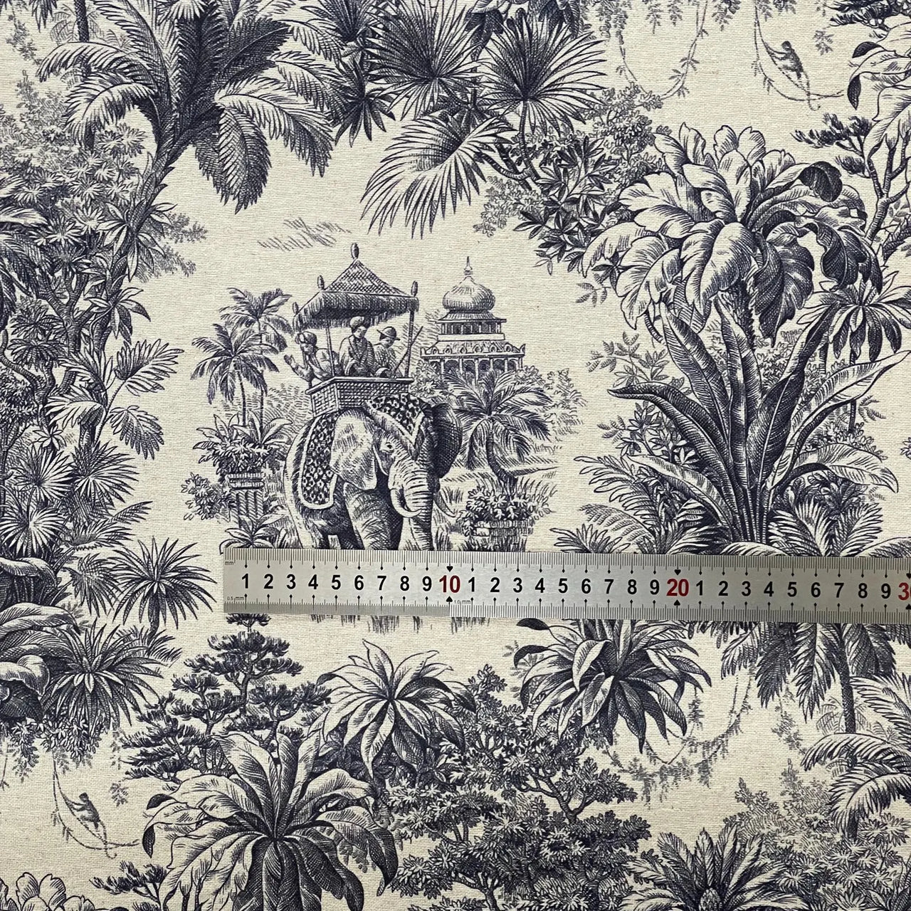 Toile curtain fabric in blue and beige with palm tree design