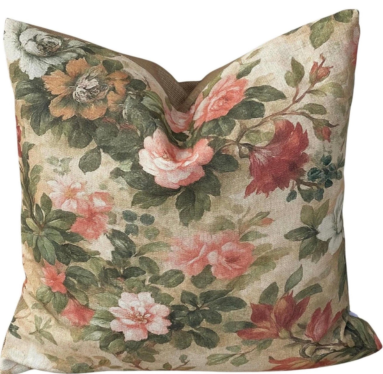 Vintage rose floral cushion cover with pink and burgundy flowers on a warm yellow-beige background