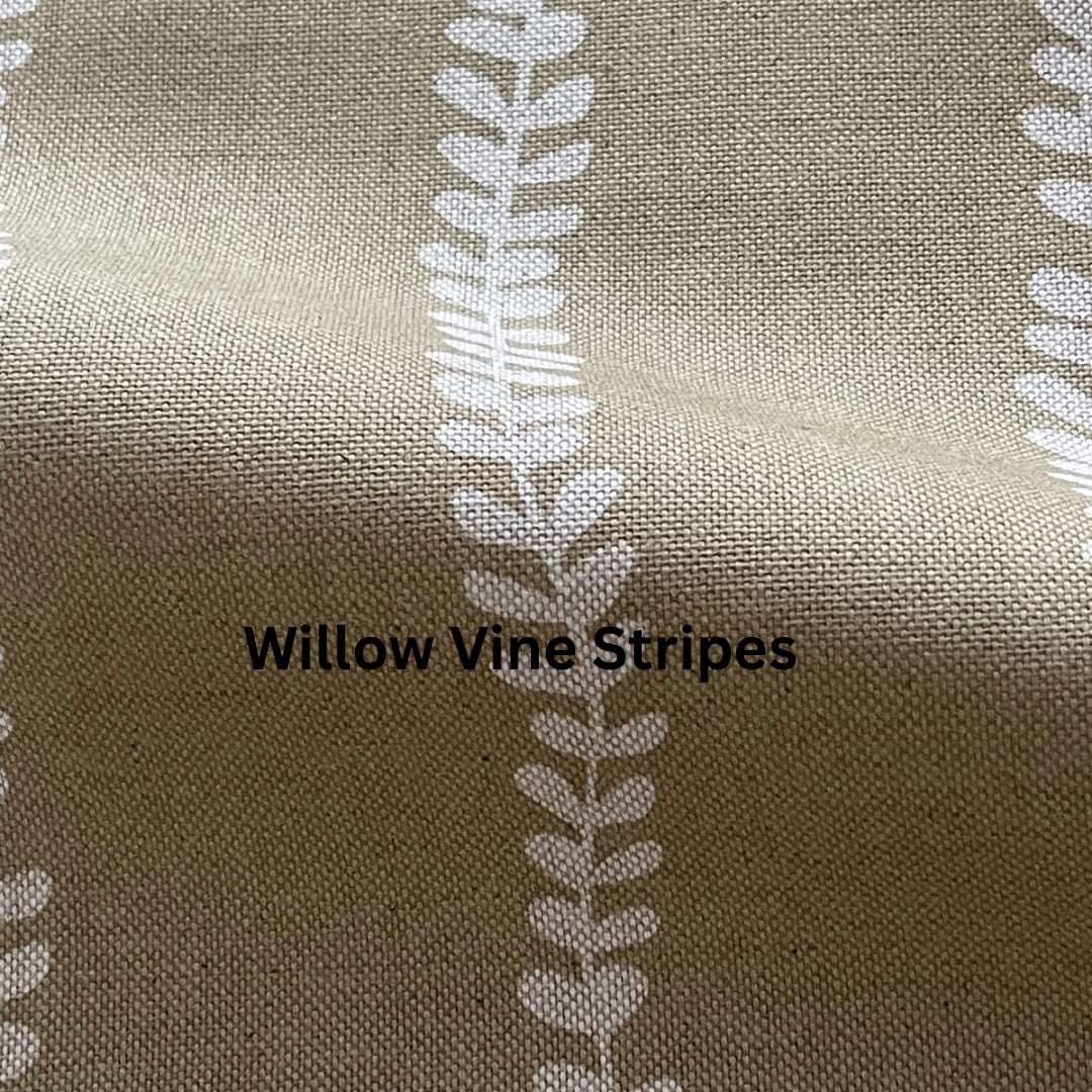 Textured fabric with white vine stripes on a beige background, labeled 'Willow Vine Stripes'.
